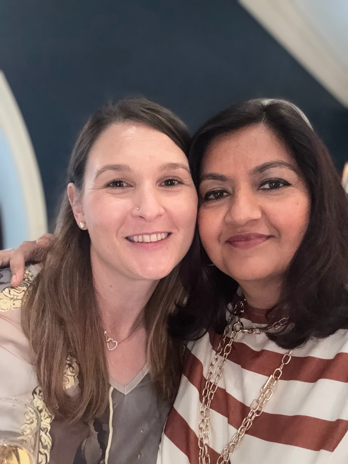Two IWC Durban members close together at an evening event